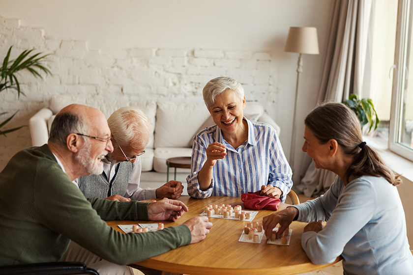 group of four cheerful senior people group of four cheerful senior people