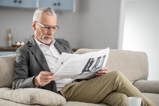 handsome male person reading handsome male person reading