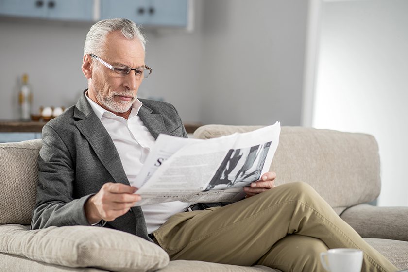 handsome male person reading handsome male person reading