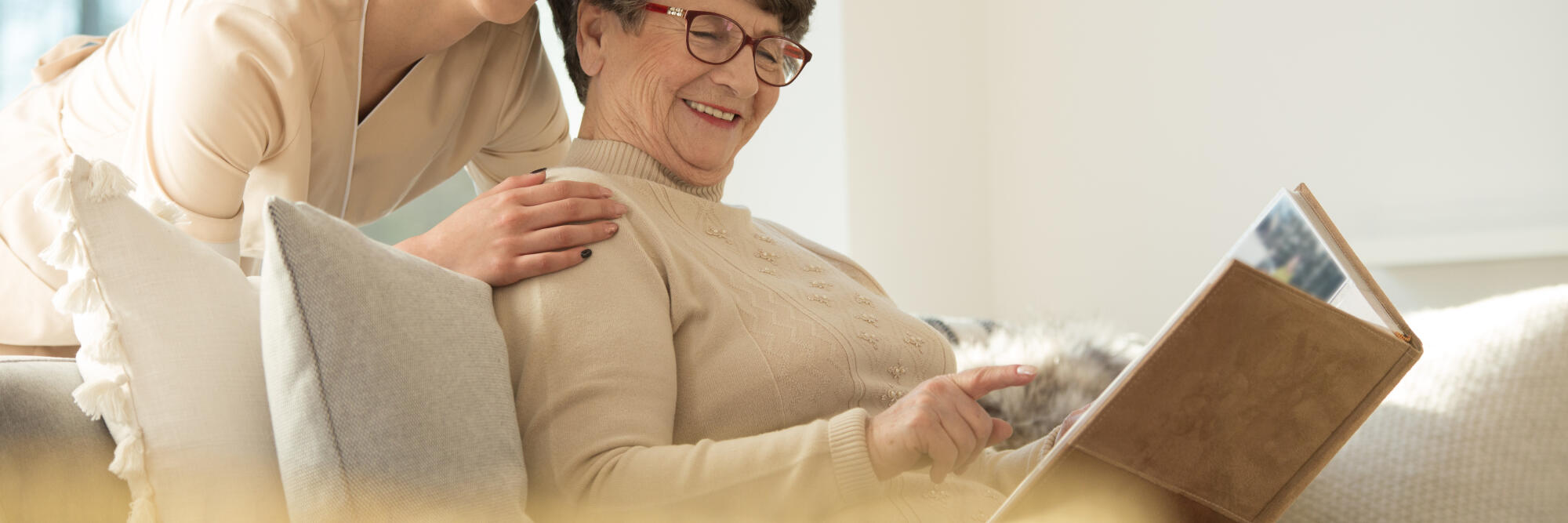 Panorama,Of,Smiling,Elderly,Woman,Reading,A,Book,In,A